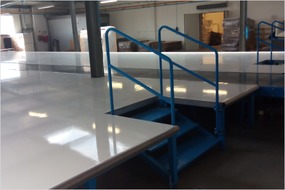 A conveyor with platforms for the furniture industry