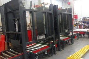 2015. Pallet transport system with a stacker and trolleys