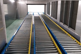 2016. Pallet transport system for a freezer