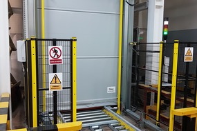 2018. Four-pillar vertical conveyor in a bakery