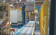 2008. Pallet transport system with a stacker