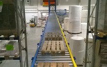 2015. Pallet transport system with a vertical conveyor